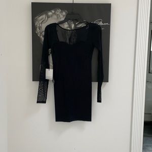 BeBe black mini dress size small NWT